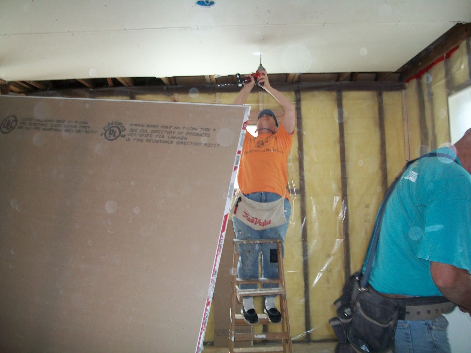 Here, There, and Just About Anywhere Putting up drywall