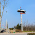 A sign post directing customers to a second-hand car Company in China
