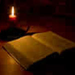 Bible Lit by Candle