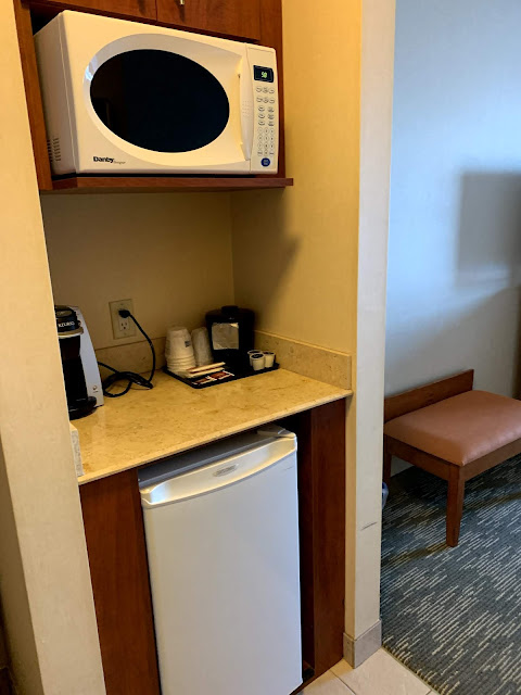 a microwave on a counter in a room