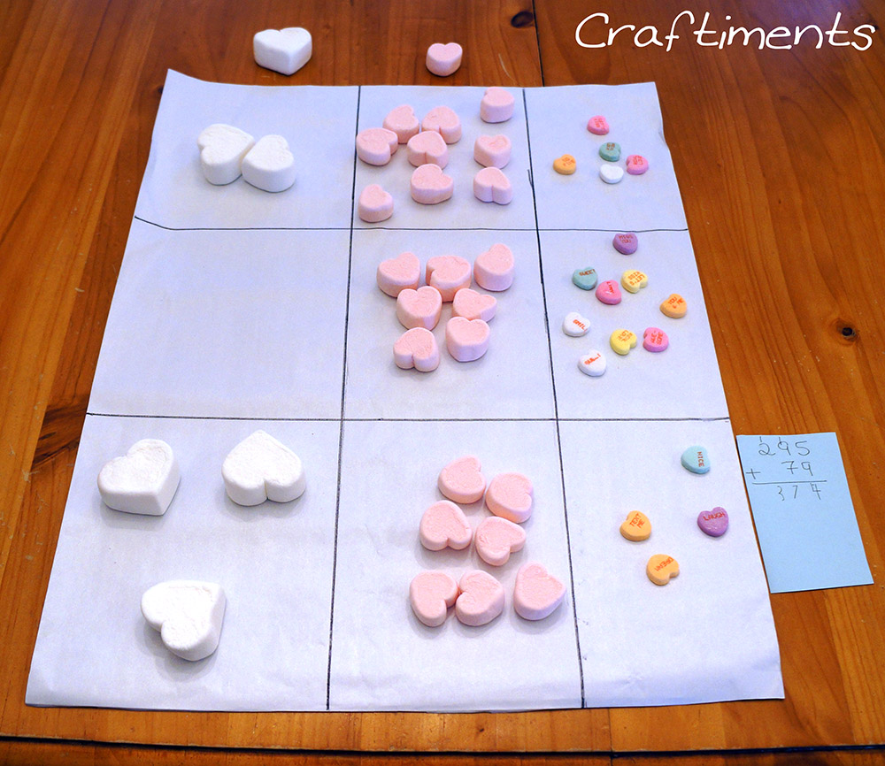 Craftiments:  Addition with regrouping using candy heart manipulatives