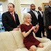 Kneeling on a sofa, in heels, while snapping photos puts Kellyanne Conway back in hot water