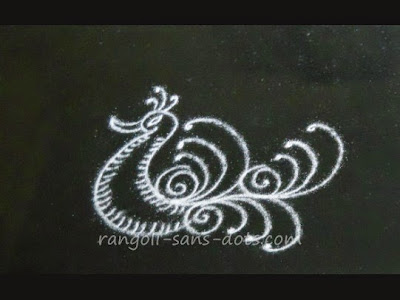 a simple representation of a bird bird-kolam3.jpg