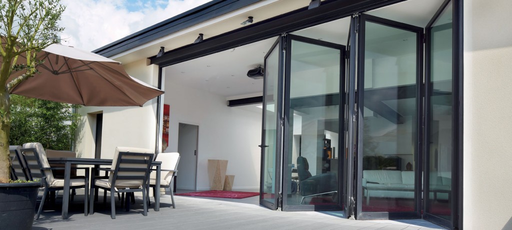 Folding Patio Doors To Folding Patio Doors Turn Courtyard Into Outdoor Living Space Marlin Windows Folding Patio Doors To Folding Patio Doors Turn Courtyard Into Outdoor Living Space Marlin Windows