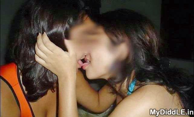 Sexy college chicks enjoy kissing each other