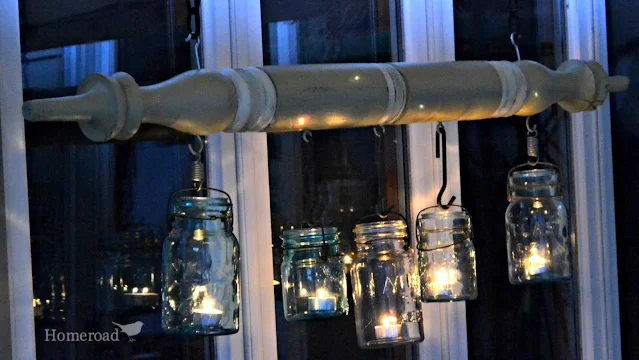 Hanging jars with lights on at night