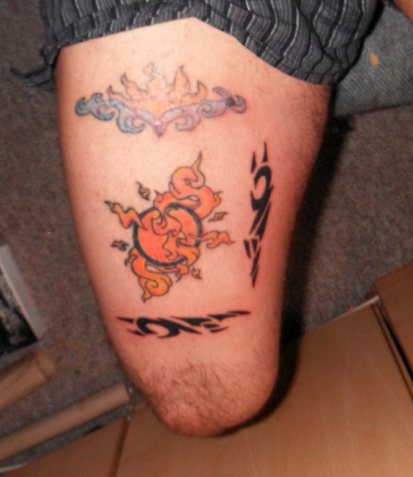 Steve Richings' Tatfolio [Self Tattoo] Sun tattoo on right thigh, with
