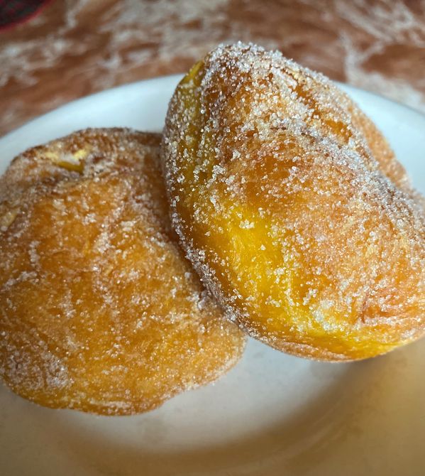 A plate of Lola Nena's old fashioned triple cheese filled donuts