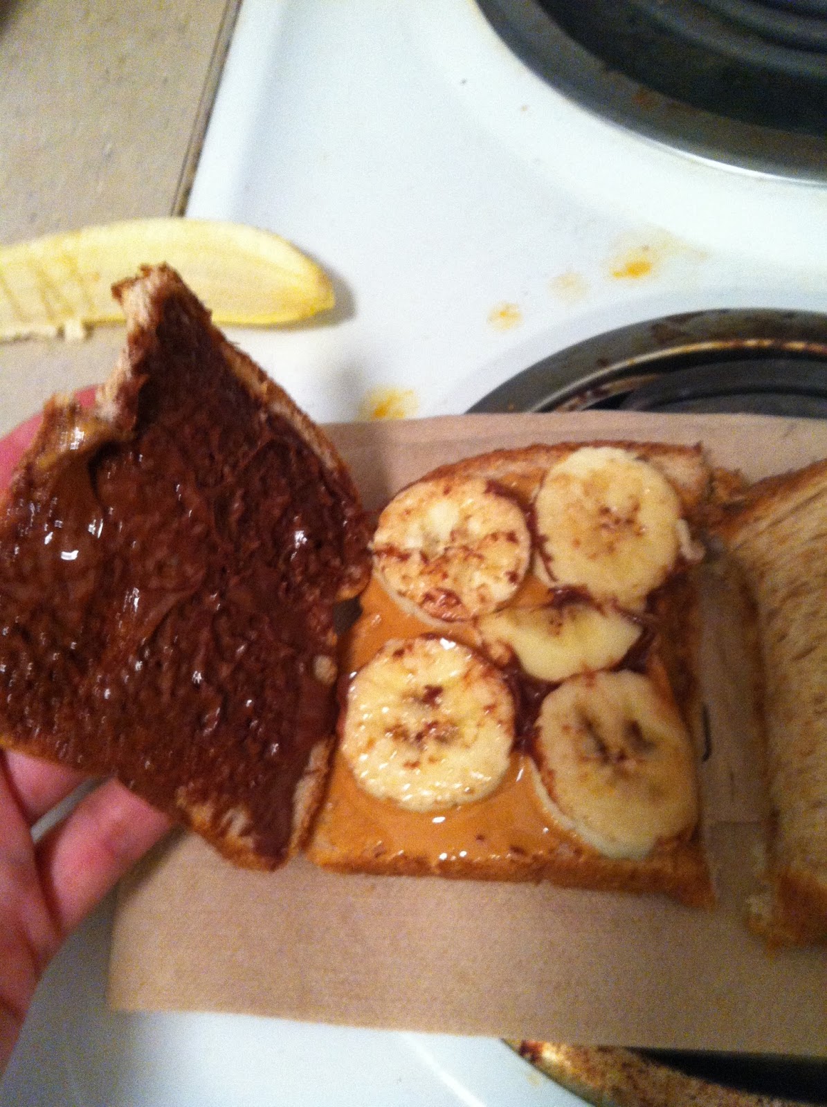 Budget Epicurean Peanut butter, banana and Nutella sandwich