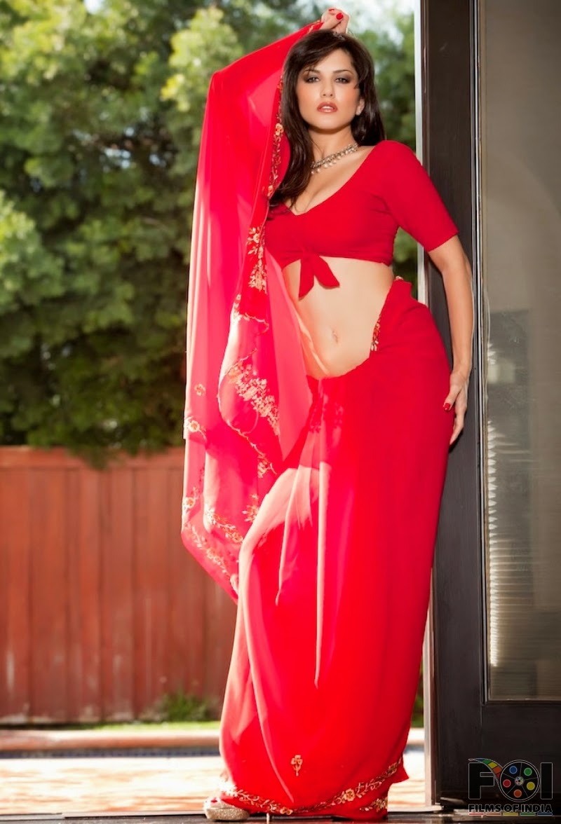 Actress Model Sunny Leone Hot Exclusive Pictures In Red Saree.