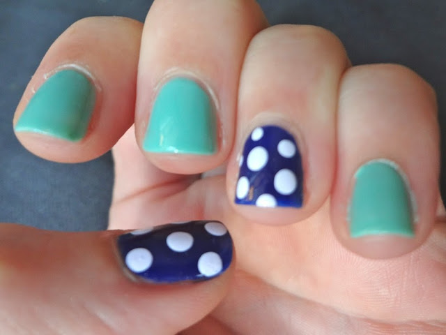 navy polka dot accent nails