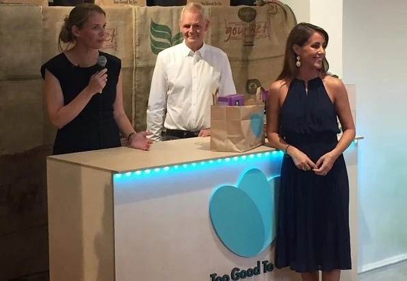 Princess Marie wore Michael Kors pleated flared dress. Princess Marie attended the opening of new store of Too Good To Go in Frederiksberg
