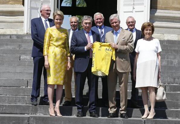 Queen Mathilde wore a yellow belted Natan dress. start of the 106th edition of Tour de France cycling race in France