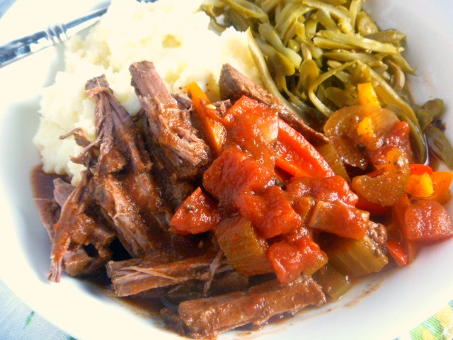 This Cajun Pot Roast is a twist on a classic but will have your mouth bursting with flavor and craving more! Slice of Southern