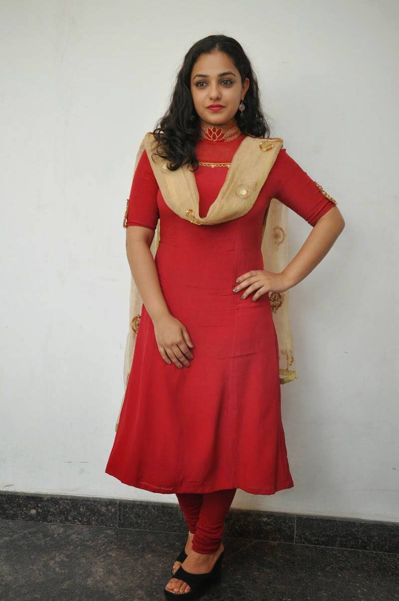 Actress Nithya Menen Hot Photos At Movie Interview In Red Dress