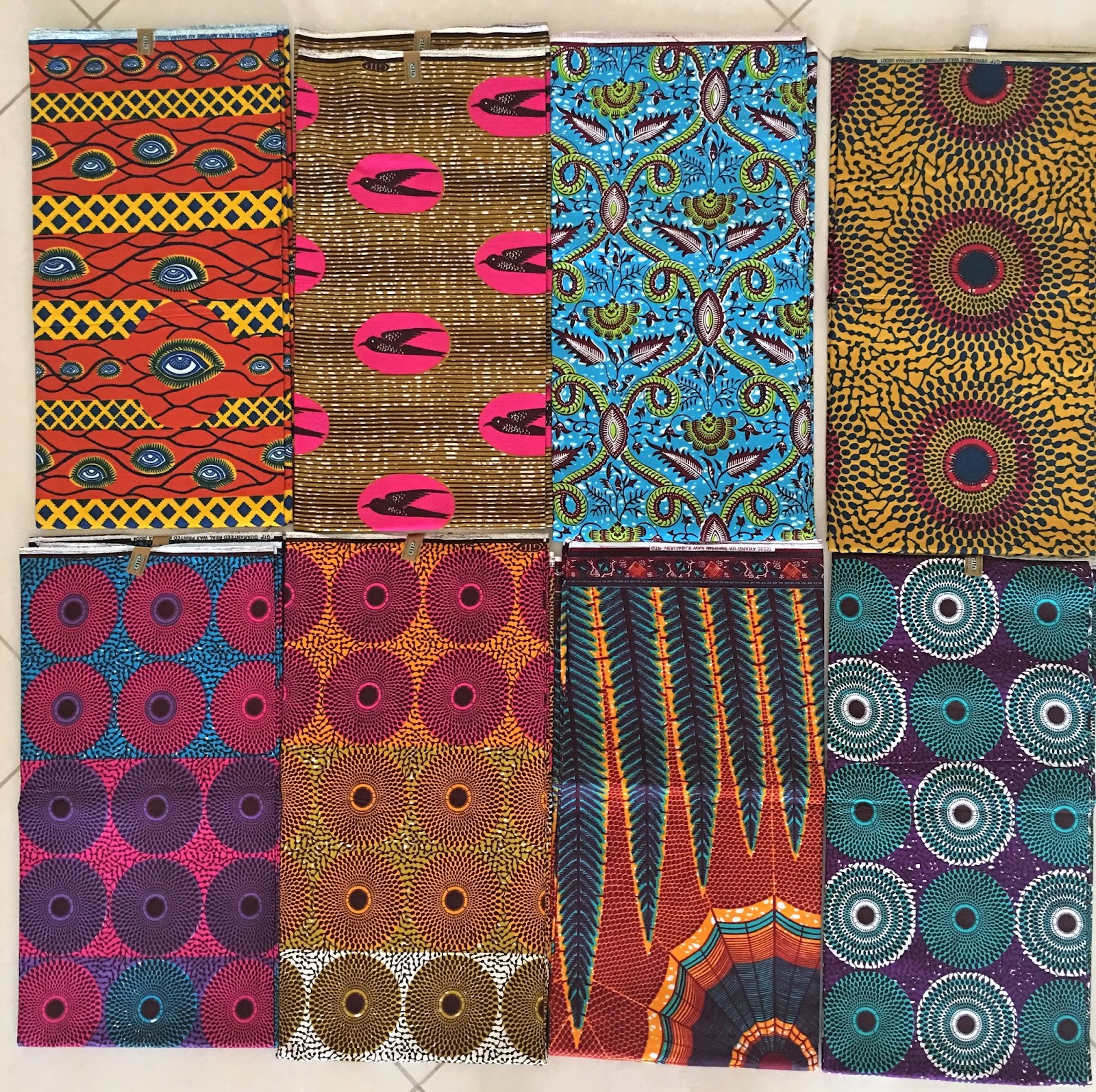 Quilts and Boxes Buying African fabrics at Makola Market in Accra