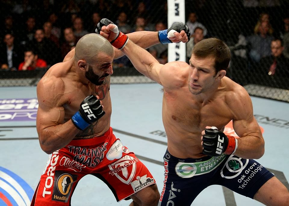 UFC Fight Night 35: Rockhold shuts down Phillipou with body kicks ...