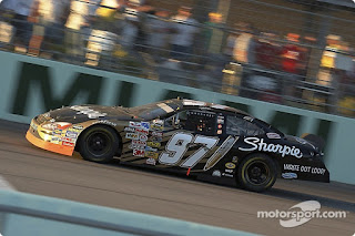 Kurt Busch races to the finish line to win NASCAR'S Nextel Cup Championship in 2004.
