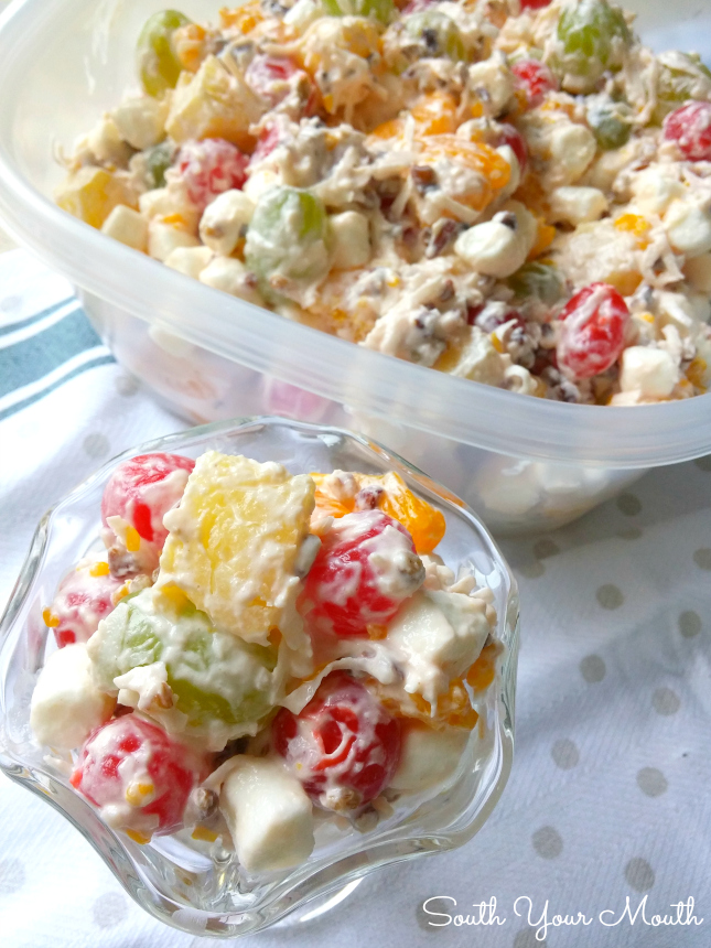 Ambrosia Fruit Salad! This retro fruit salad is simple and perfect with pineapple, mandarin oranges, cherries, green grapes, pecans, coconut and sour cream.