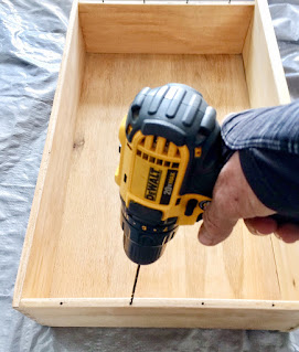 drilling holes in drawer sides