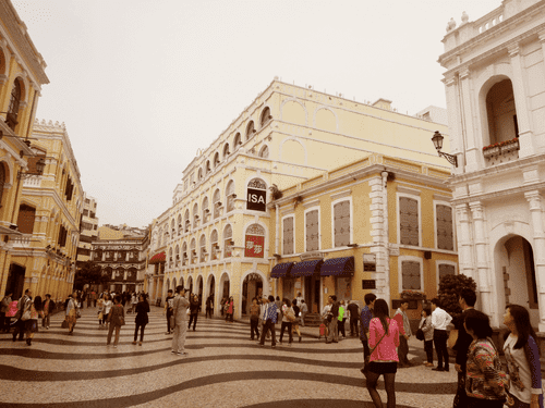 An avenue surrounded by antique buildings at Largo do Senado, Macau