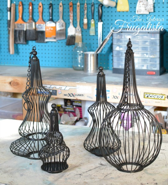 Wire hanging candle holders repurposed into lighted Outdoor Christmas Ornaments