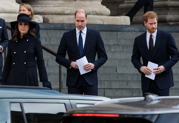 Duchess Catherine -Kate Middleton wore a double wool coat by Carolina Herrera. Jimmy Choo Georgia shoes.