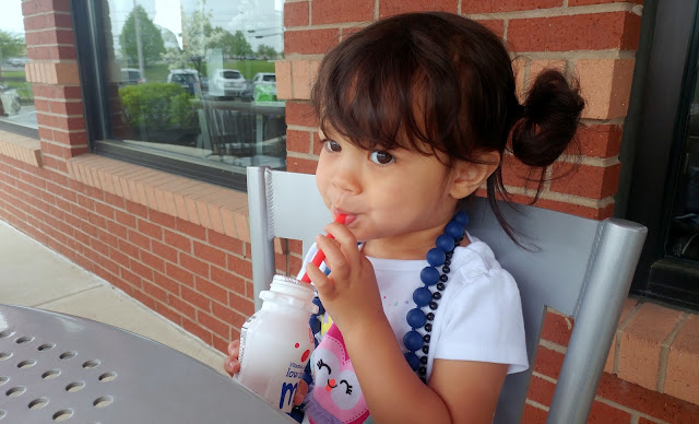 Toddler-Drinking-Milk-with-Straw-tasteasyougo.com