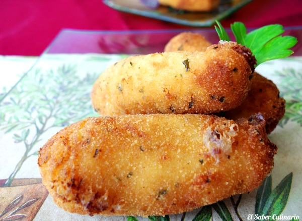 croquetas de pescado con rebozado de ajo y perejil