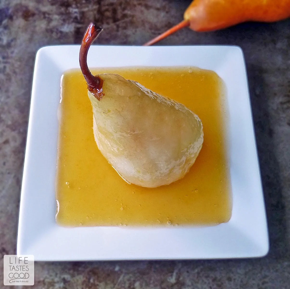 Vanilla Poached Pears with Apricot Sauce | by Life Tastes Good is an impressive dessert that will have everyone in awe of your culinary skills! We'll keep it just between us how easy these really are <wink>. #CleverlyPoached #CleverGirls