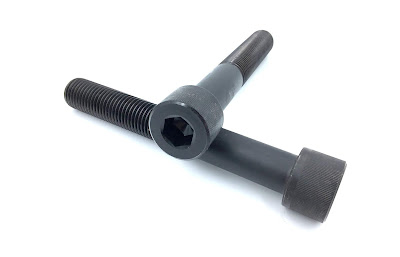 Custom Large Socket Cap Screws For Aerospace Applications - 1-1/4 -7 X 9 Inches In A574 Material With Black Oxide Finish