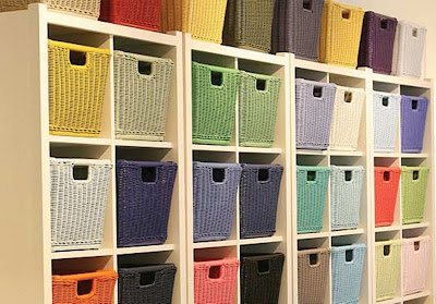 wicker baskets, various colors, in shelf cubbies