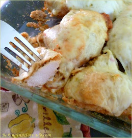 Pepper Jack Chicken: marinated in a spicy dressing, coated in bread crumbs and baked with creamy melted Pepper Jack cheese, a favorite way to serve this dinner is with salsa.| Recipe developed by www.BakingInATornado.com | #recipe #dinner
