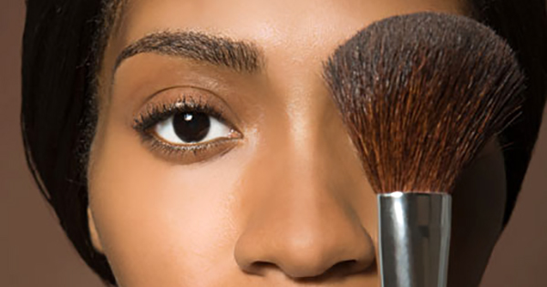 Black woman wearing makeup