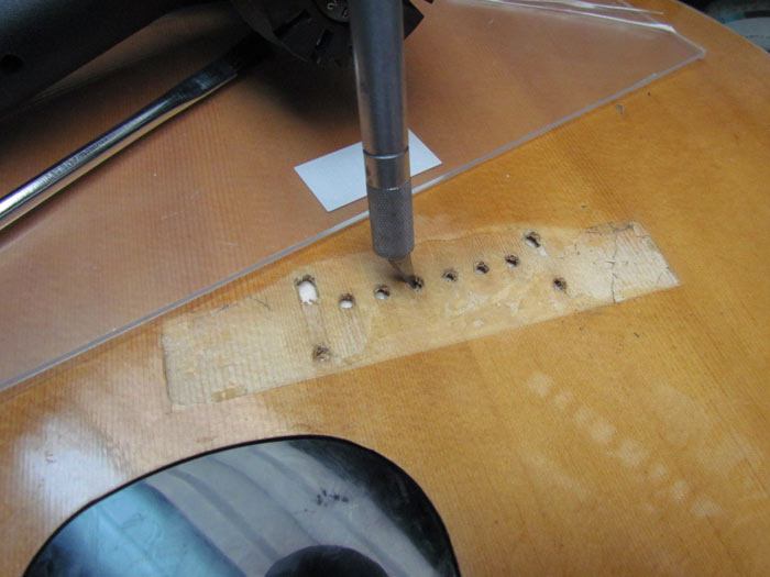 Gluing a New Bridge Plate on the Epiphone Acoustic Guitar Using Hide Glue Crawls Backward (When