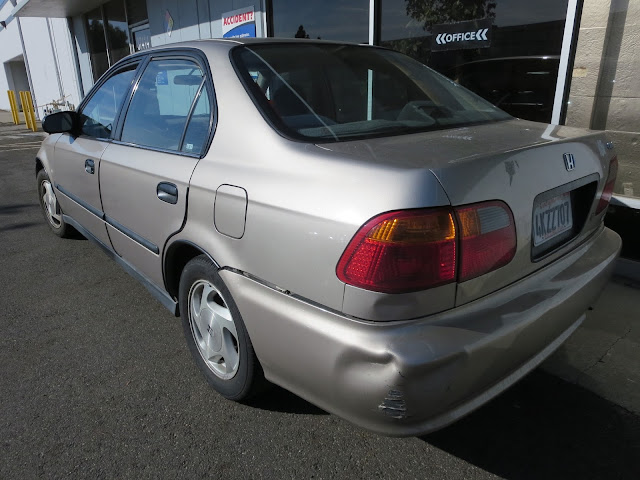 2000 Honda Civic with rear end damage before repairs at Almost Everything Auto Body