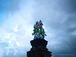 Krishna Instructs Arjuna Monument And The Sky In The Parking Lot At Badung, Bali, Indonesia