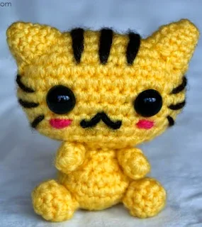 http://www.craftsy.com/pattern/crocheting/toy/cute-little-cat/101803