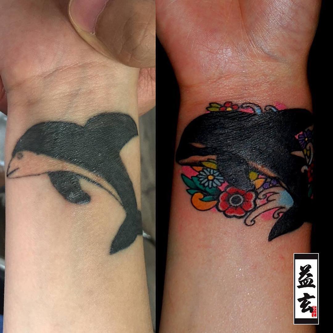 Redone dolphin cover up tattoo Tattoo Covers