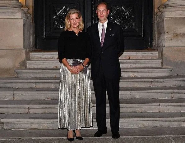 Countess of wessex wore Emilia Wickstead Dalia Python-print blouse and Richie Python-print skirt and carried Sophie Habsburg Amber clutch