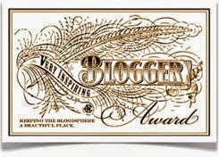 PREMIO BLOGGER AWARD