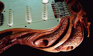 guitarras de madera talladas a mano