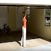 It Looks Like Any Ordinary Garage. Then She Yanks On These Two Straps. What Happens? WOW