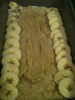 Layered bananas on top of banana bread batter.  