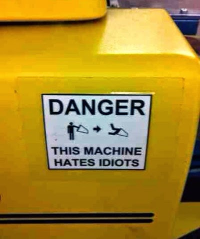 http://www.funnysigns.net/this-machine-hates-idiots/