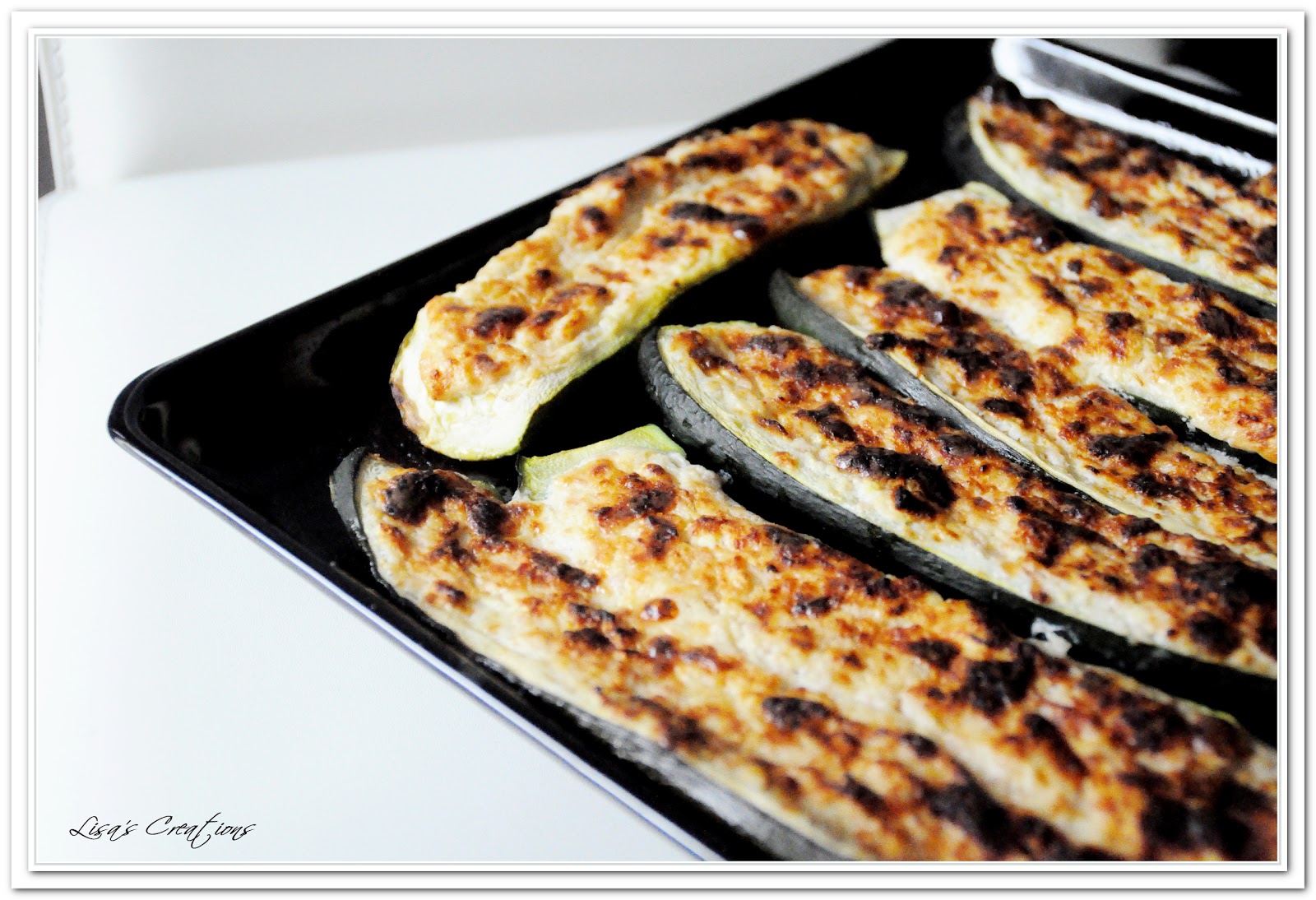 Zucchine ripiene al prosciutto cotto, formaggi e pepe nero