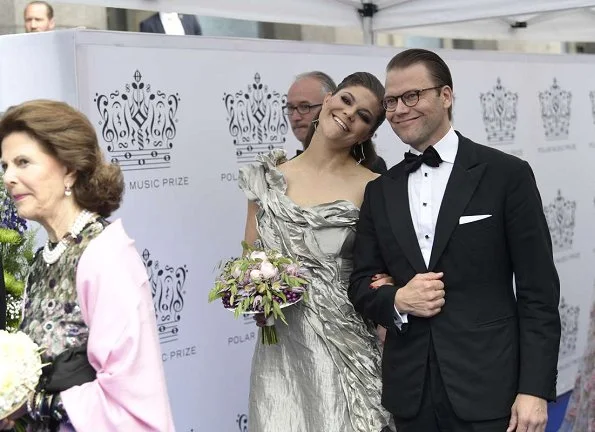 King Carl Gustaf, Queen Silvia, Crown Princess Victoria, Prince Daniel, Princess Madeleine, Prince Carl Philip and Princess Christina, Mrs. Magnuson