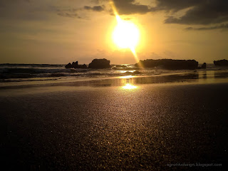 Sunset Light On The Sands Waves And Rocks At Batu Bolong Beach, Canggu Village, Badung, Bali, Indonesia