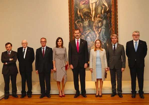 Queen Letizia wore Pedro del Hierro Checked dress and Magrit red pumps, carries Magrit clutch bag. She wore a Checked Dress by Pedro del Hierro