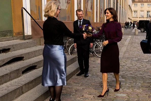 Crown Princess Mary, wore a burgundy blouse and burgundy skirt, Prada suede pumps, she carries Hugo Boss clutch